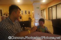Darwin laughs as daddy tries to amuse him at the outdoor Italian restaurant of Ocean Coral & Turquesa.jpg