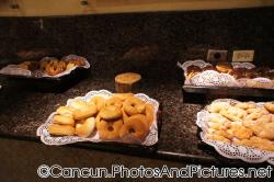Donuts, pastries and fried bread at Ocean Coral & Turquesa breakfast buffet.jpg