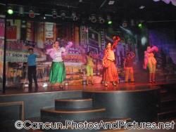 Dancers perform in costumes at Ocean Coral & Turquesa.jpg