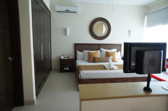 Bedroom of Bahia Principe Sian Kaan junior suite.jpg