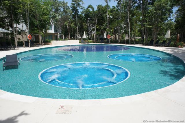 Jetted circular pool at Grand Bahia Principe Sian Kaan.jpg