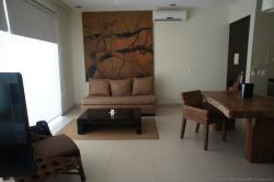 Living room eating area of Bahia Principe Sian Kaan junior suite.jpg