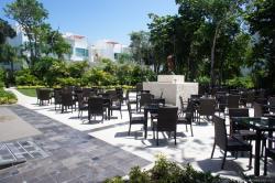 Outdoor entertainment area just beyond lobby at Bahia Principe Sian Kaan.jpg