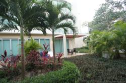 Outdoor patio of a Gran Bahia Principe Sian Kaan hotel villa.jpg