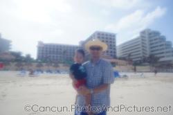 Darwin and daddy at beach of GR Solaris.jpg