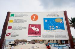 Scuba Quatic sign indicating reef and warnings at Gran Bahia Principe Sian Kaan private beach.jpg
