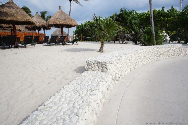 Shell composed rock wall at Gran Bahia Principe Sian Kaan private beach.jpg