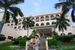 Darwin and daddy stand in front of fountain outside of GR Solaris lobby.jpg