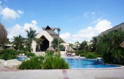 View of Gran Bahia Principe Akumal lobby from pool area.jpg