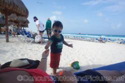 Darwin hands mommy a shell at the GR Solaris beach.jpg