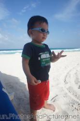 Darwin holds a shell at GR Solaris beach.jpg