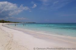 Guests playing in the beach waters of Grand Palladium Kantenah.jpg
