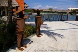 Metal Statues of People Playing Music at Grand Palladium Kantenah.jpg