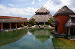 Lobby of Grand Palladium Kantenah viewed in front of pond.jpg