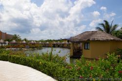Riverfront Hotel Room Huts at Grand Palladium Kantenah.jpg