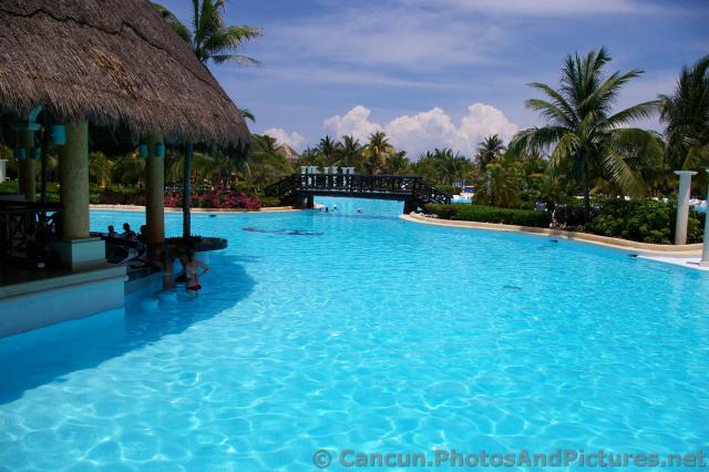 Beautiful Pool with Bridge and Pool Bar at Grand Palladium Kantenah.jpg