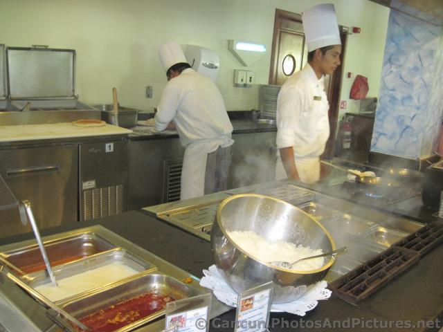Chefs cooking up pasta on demand at Grand Palladium Kantenah.jpg