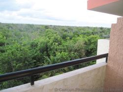 View of the jungle from Grand Palladium Kantenah villa.jpg