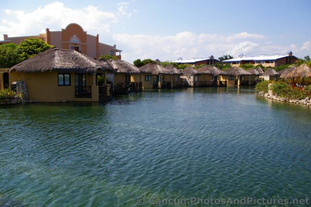 Waterfront units next to River at Grand Palladium White Sand.jpg