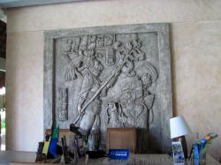 Mayan Art Plaque behind desk at Grand Palladium White Sand Lobby.jpg