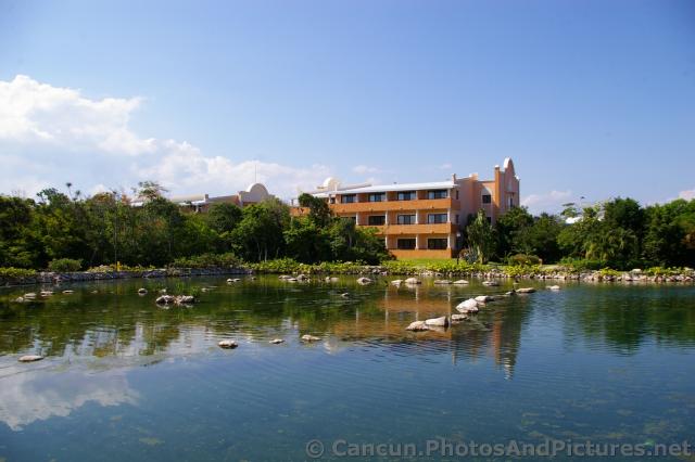 Grand Palladium White Sand Hotel Units in front of lagoon.jpg