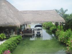 Boat Taxi parked outside of Royal Suites Yucatan Lobby Grand Palladium Riviera Maya.jpg