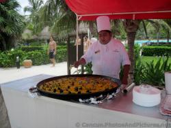 Chef Cooking up Paella Outdoors Grand Palladium Riviera Maya.jpg