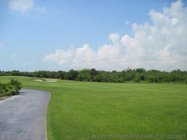 Fairway and sand traps at Playa Mujeres golf course.jpg