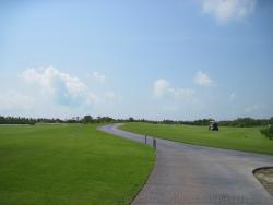 Golf cart path cuts through the Playa Mujeres golf course.jpg