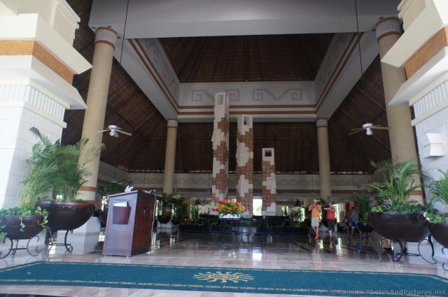 Gran Bahia Principe Coba lobby with 3 stone columns.jpg