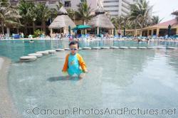 Darwin stands at kid's pool area of GR Solaris.jpg