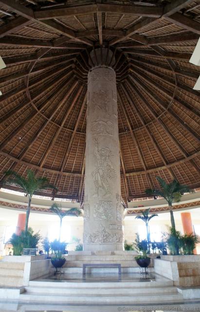 Single large pole and circular roof of Grand Bahia Principe Tulum lobby.jpg