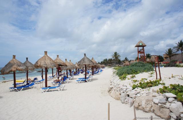 Vacationers at beach of Grand Bahia Principe Tulum.jpg