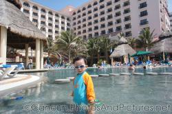 Darwin stands in kid's pool area of GR Solaris.jpg