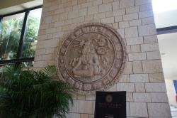 Circular Mayan wall decor above Bahia Principe Privilege Club sign at GBP Tulum.jpg