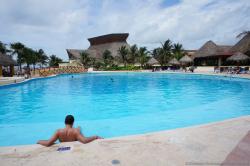 Circular pool with bridge at Grand Bahia Principe Tulum.jpg