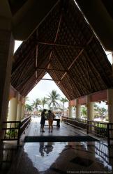 Covered walkway outside of lobby of Grand Bahia Principe Tulum.jpg