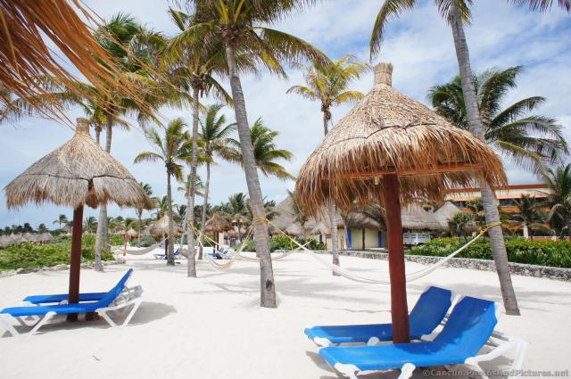 Hammocks at Grand Bahia Principe Tulum beach.jpg