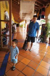 Darwin walking in front of daddy at Hacienda Dona Isabel Gran Bahia Principe.jpg