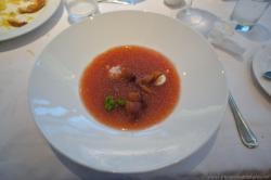 Delicious tomato and crab vichyssoise cold soup with bacon quail egg and balsamic reduction at Alux restuarant Gran Bahia Princi
