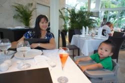Darwin in high chair next to mommy at Alux restaurant at Gran Bahia Principe Sian Kaan.jpg