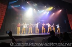 Dancers hold hands and perform on stage at GR Solaris show.jpg