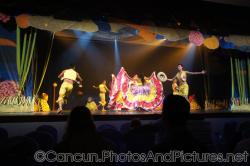 Dancers in bright costumes perform in show at GR Solaris.jpg