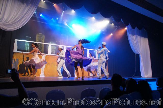 Dancers in costumes perform at GR Solaris.jpg