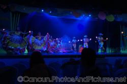 Dancers in traditional costumes dance on stage at show at GR Solaris resort.jpg