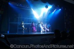 Dancers perform in bell-bottom pants on stage at GR Solaris show.jpg