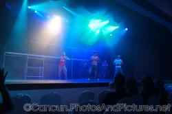 Male dancers perform on stage at GR Solaris show.jpg