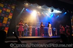 Performers in disco costumes at GR Solaris.jpg