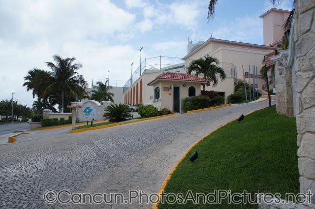 GR Solaris entrance area with tennis court above.jpg