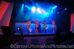 Women in 70s costumes dance at GR Solaris.jpg